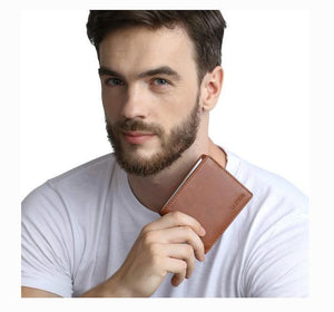 Model holding pleather texture vegan wallet